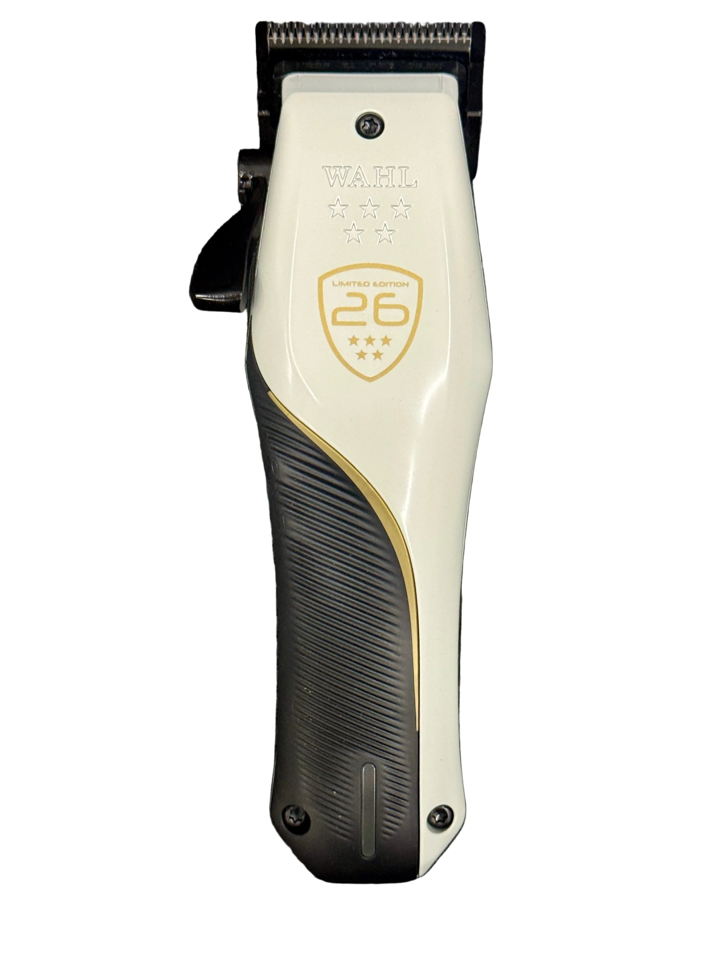White and black hair clipper with gold accents on a dark background