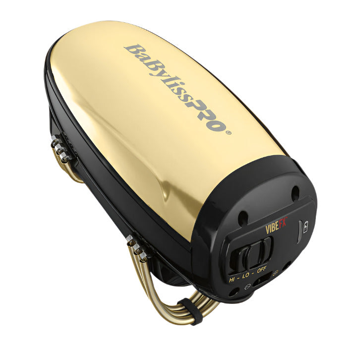BabylissPro VibeFX Cordless Massager in gold, ergonomic handheld design