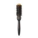 Black hairbrush with bristle head on a white background
